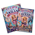 Two colorful children's books titled 'TULI PA Visits the Ocean' are shown overlapping on a light wood surface. The left book is a 'Coloring Book' and the right book is a 'Story Book', both featuring whimsical ocean-themed illustrations including a girl in a pink dress, a sea otter, a pelican, a dolphin, and coral reefs.